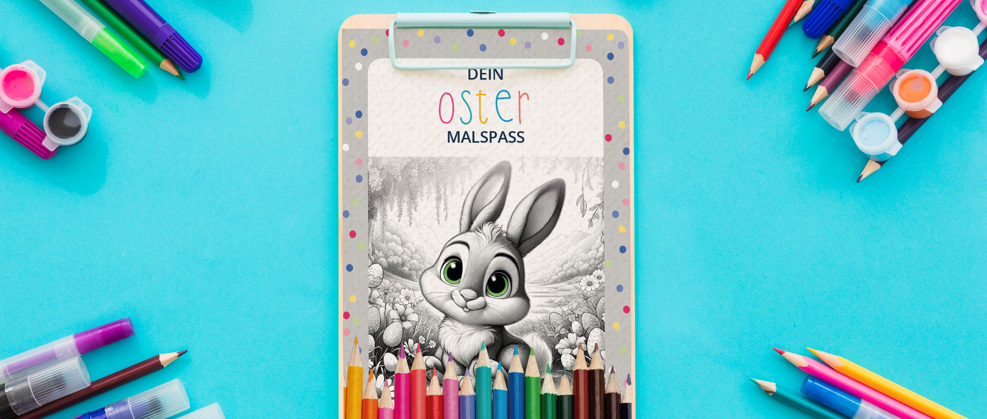 Oster-Malbuch mit süßem Hasenmotiv, umgeben von bunten Buntstiften und Malutensilien auf blauem Hintergrund.​​​​​​​​​​​​​​​​​​​​​​​​​​​​​​​​​​​​​